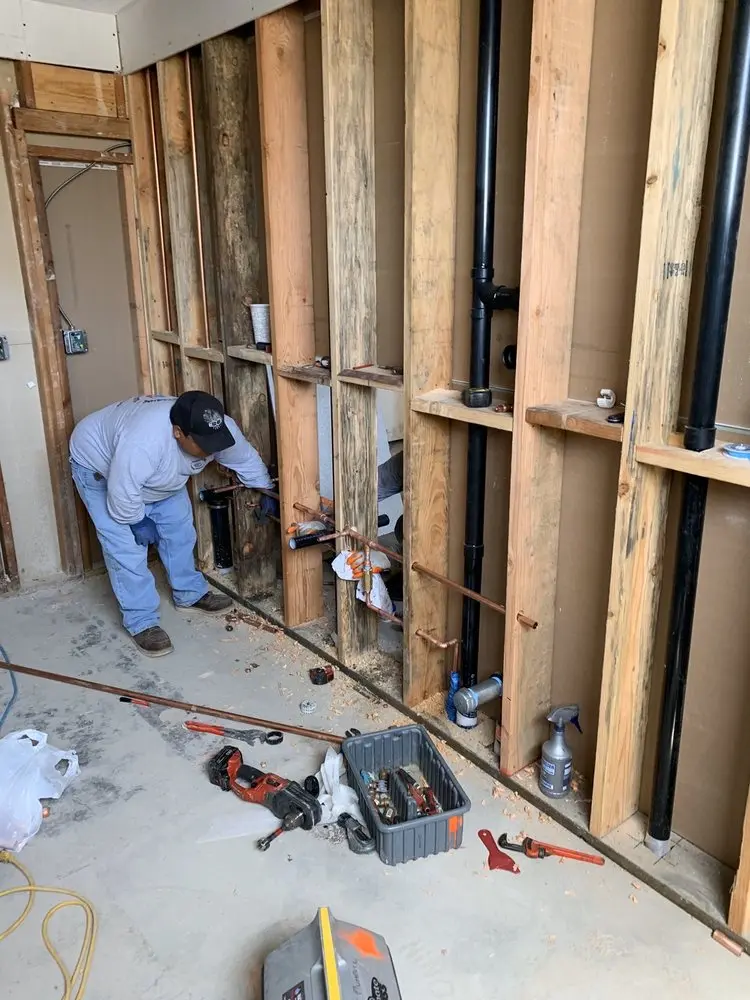 Commercial rough-in plumbing for Water Heater Replacement in Clayton